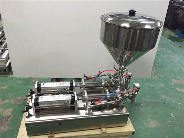 Mye brukt dobbelthodet fyllmaskin med jordbærsyltetøy 